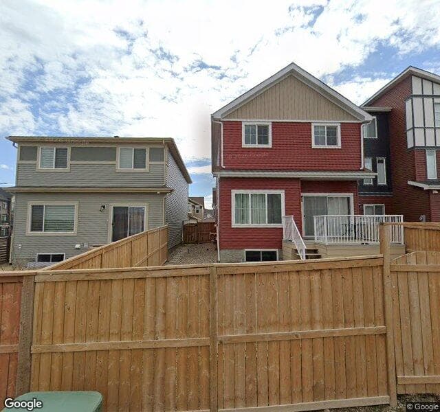 Street view of 208 Lucas Manor NW, Calgary