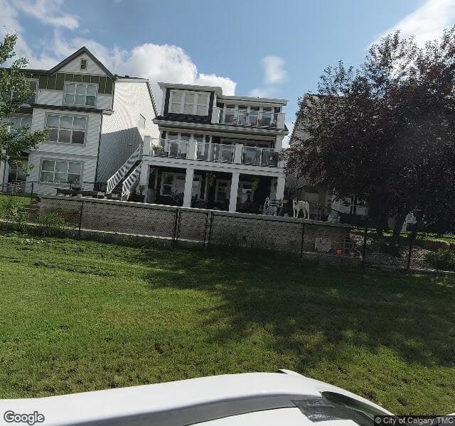 Street view of 328 Copperpond Circle SE, Calgary