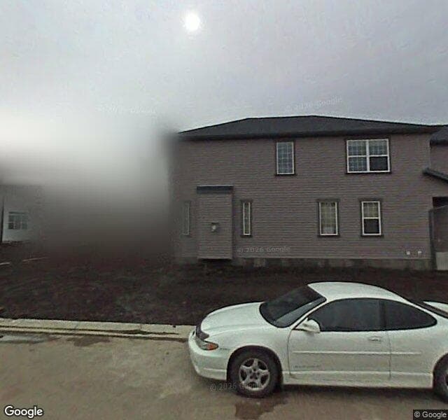 Street view of 51 Saddlecrest Gardens NE, Calgary
