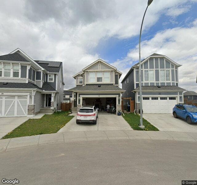 Street view of 32 Magnolia Heath SE, Calgary