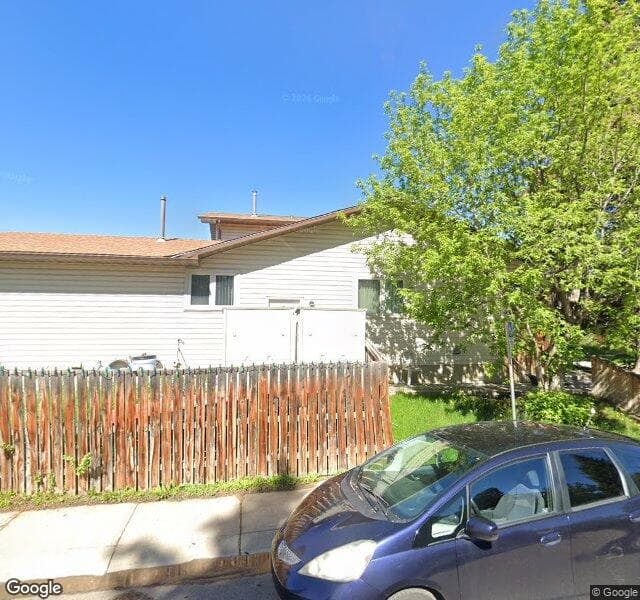 Street view of 33 Cedarwood Hill SW, Calgary