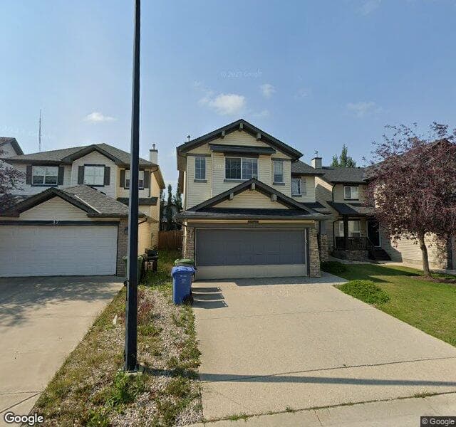 Street view of 41 Cougarstone Villas SW, Calgary