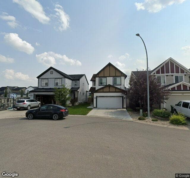 Street view of 242 Copperpond Bay SE, Calgary