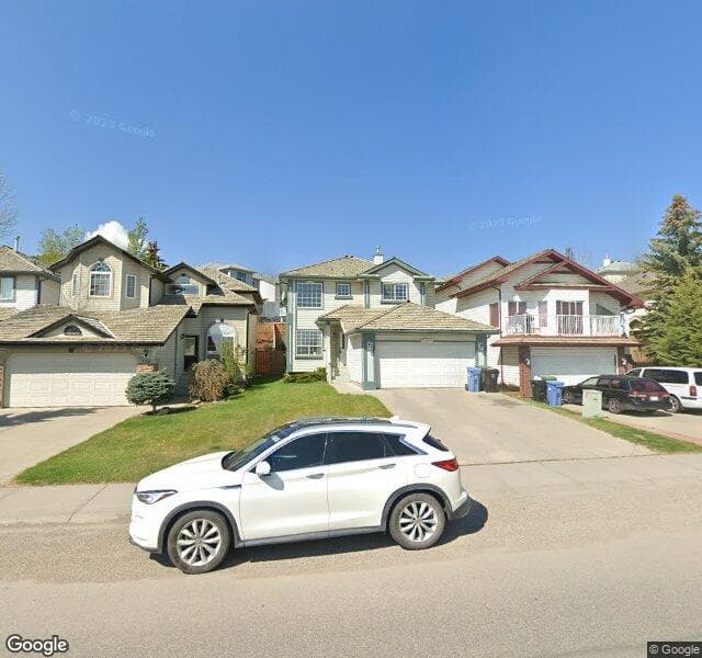 Street view of 320 Harvest Hills Drive NE, Calgary