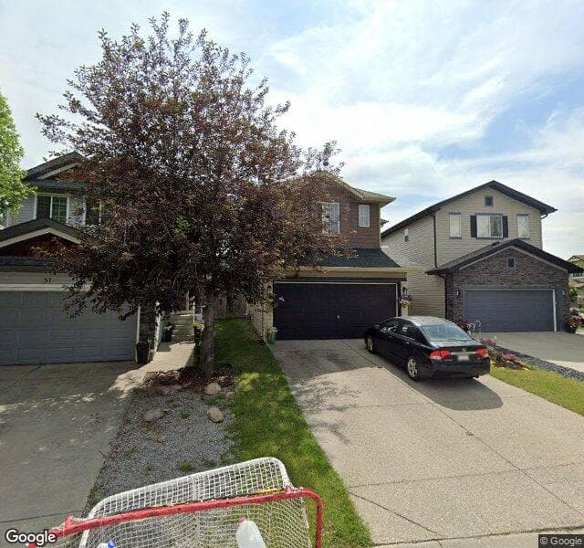 Street view of 61 Chaparral Ridge Rise SE, Calgary