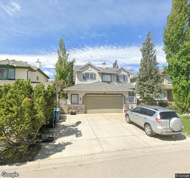 Street view of 84 Douglasdale Point SE, Calgary