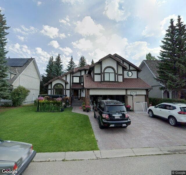 Street view of 75 Woodhaven Crescent SW, Calgary