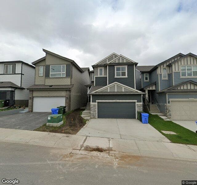 Street view of 858 Bluerock Way SW, Calgary