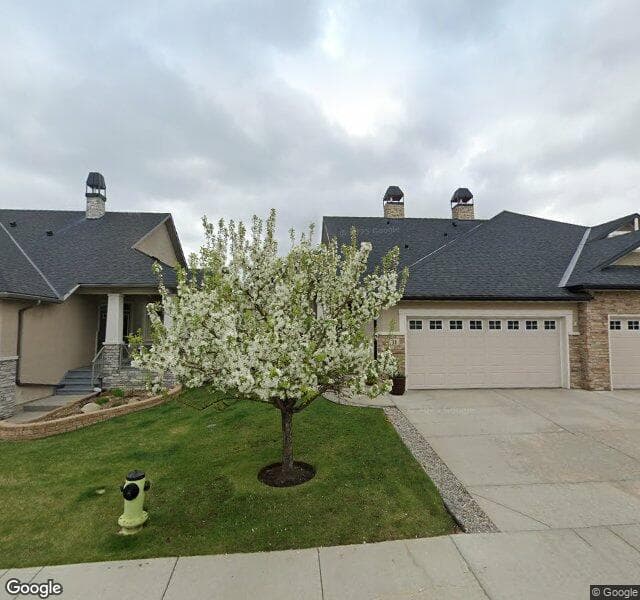 Street view of 31 Evercreek Bluffs View SW, Calgary