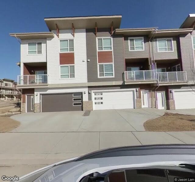 Street view of 334 Harvest Hills Common NE, Calgary