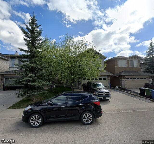 Street view of 49 Eversyde Manor SW, Calgary