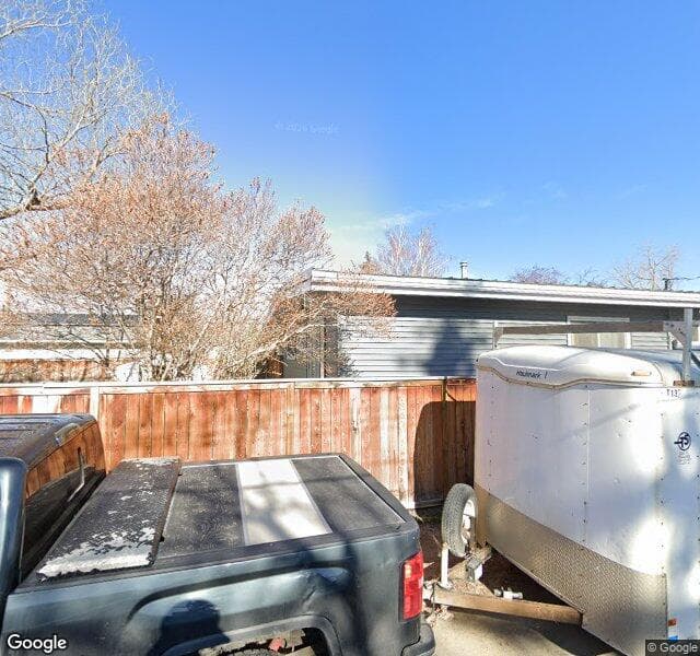 Street view of 1139 Lake Huron Crescent SE, Calgary
