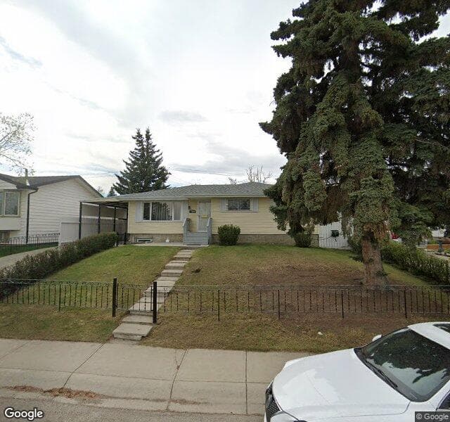 Street view of 7119 Huntercrest Road NW, Calgary