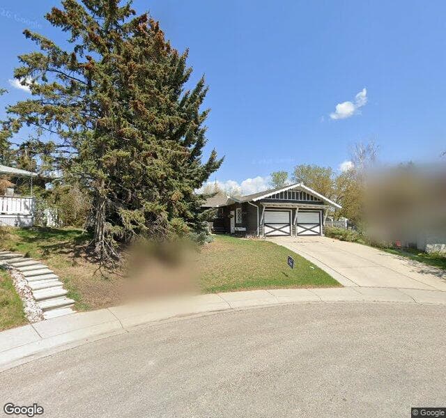 Street view of 212 Huntham Place NE, Calgary