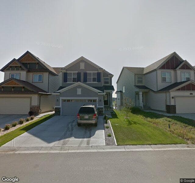Street view of 638 Copperpond Circle SE, Calgary
