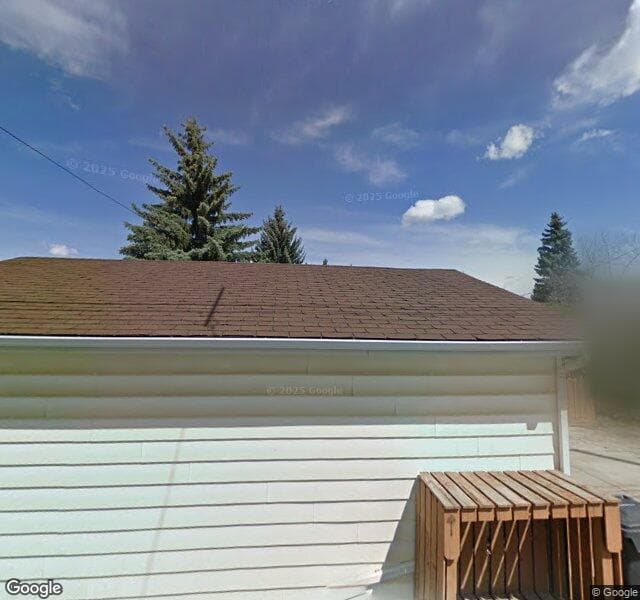 Street view of 703 28 Avenue NW, Calgary