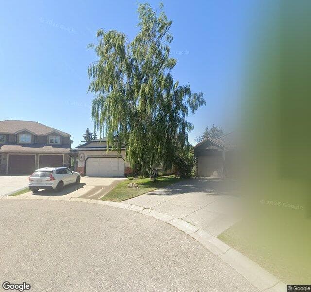 Street view of 19 Strathcanna Court SW, Calgary