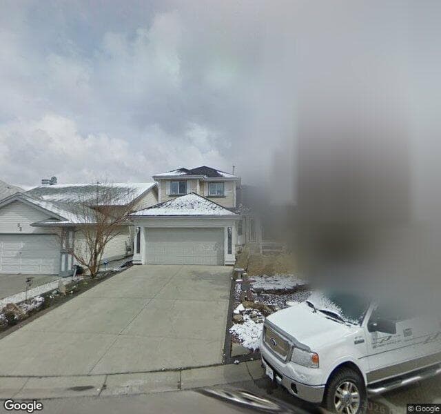 Street view of 48 Sandalwood Court NW, Calgary