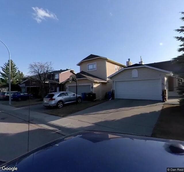 Street view of 210 Rivergreen Place SE, Calgary