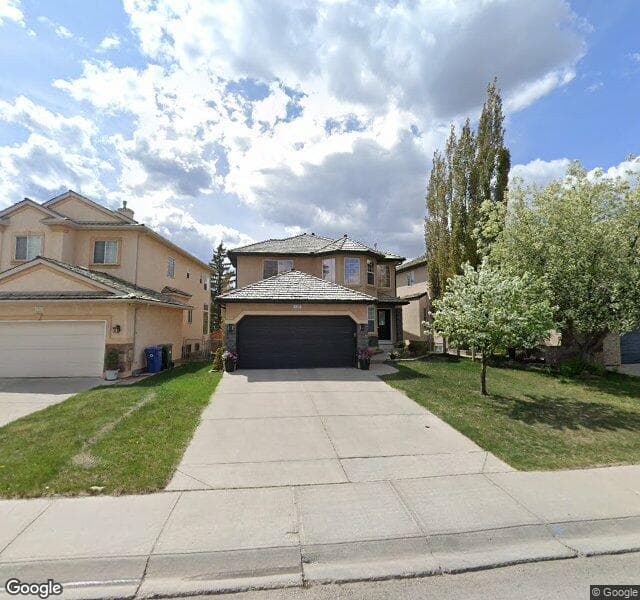 Street view of 1327 Harvest Hills Drive NE, Calgary