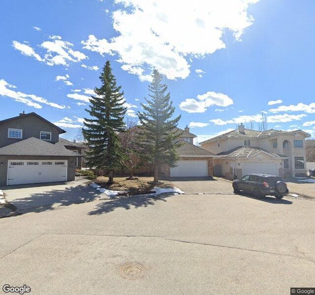 Street view of 1034 Mckenzie Lake Bay SE, Calgary