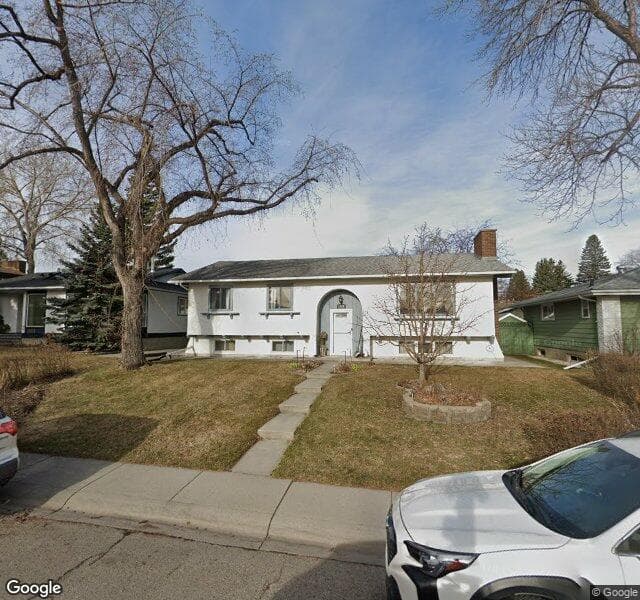 Street view of 1129 Lake Christina Way SE, Calgary