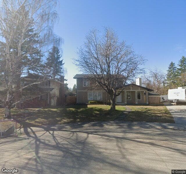 Street view of 1107 Lake Sylvan Place SE, Calgary