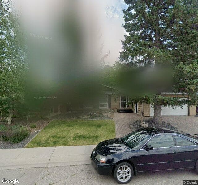 Street view of 24 Lake Twintree Place SE, Calgary