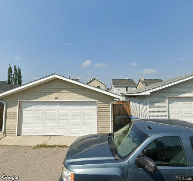 Street view of 66 Cougartown Circle SW, Calgary
