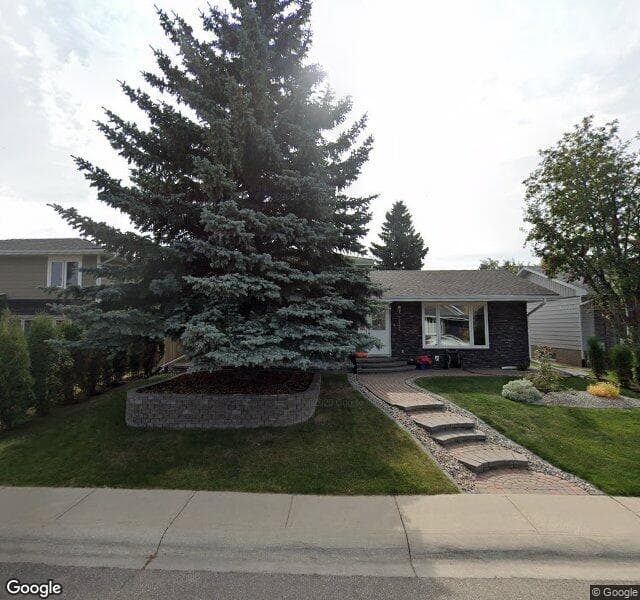 Street view of 1127 Lake Sundance Crescent SE, Calgary