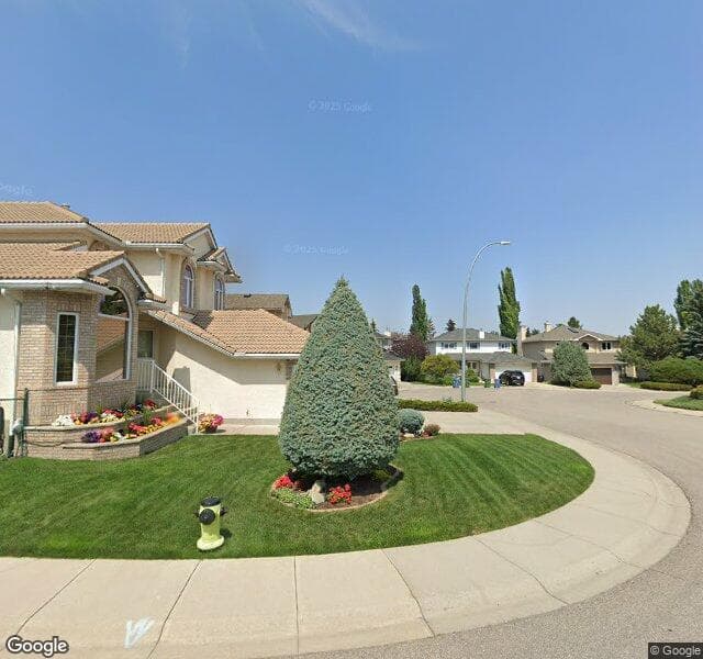 Street view of 116 Woodpark Circle SW, Calgary