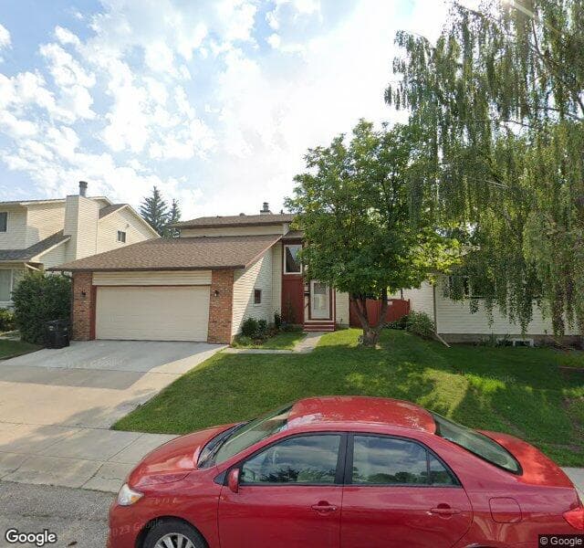 Street view of 216 Wood Crest Place SW, Calgary