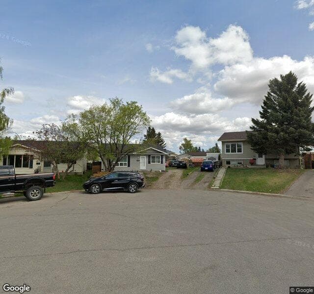 Street view of 127 Abingdon Place NE, Calgary