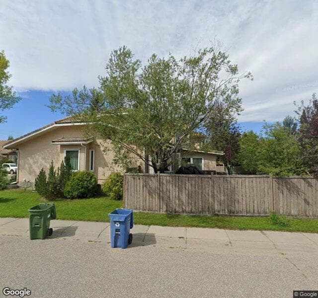 Street view of 32 Suncanyon Park SE, Calgary