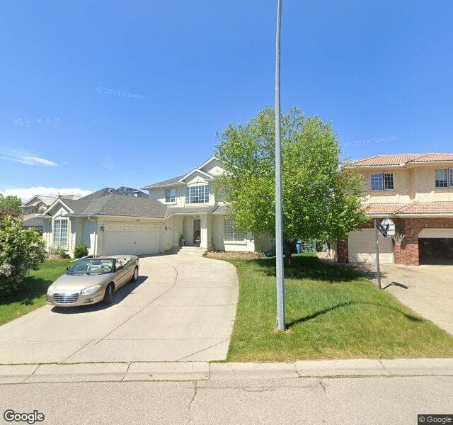Street view of 76 Harvest Lake Crescent NE, Calgary
