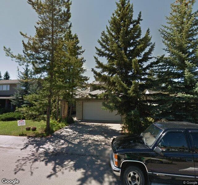 Street view of 108 Woodglen Circle SW, Calgary