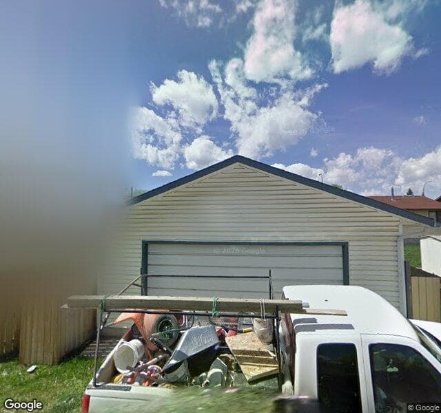 Street view of 64 Templewood Drive NE, Calgary