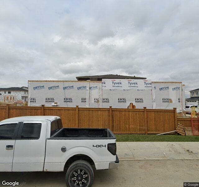 Street view of 22 Silver Spruce Road SW, Calgary