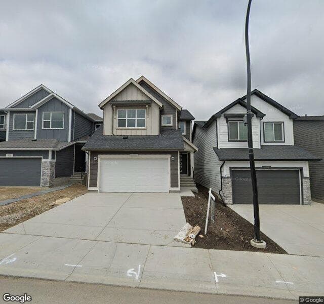Street view of 107 Versant View SW, Calgary