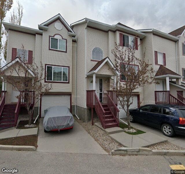 Street view of 5-15 Rocky Ridge Gate NW, Calgary