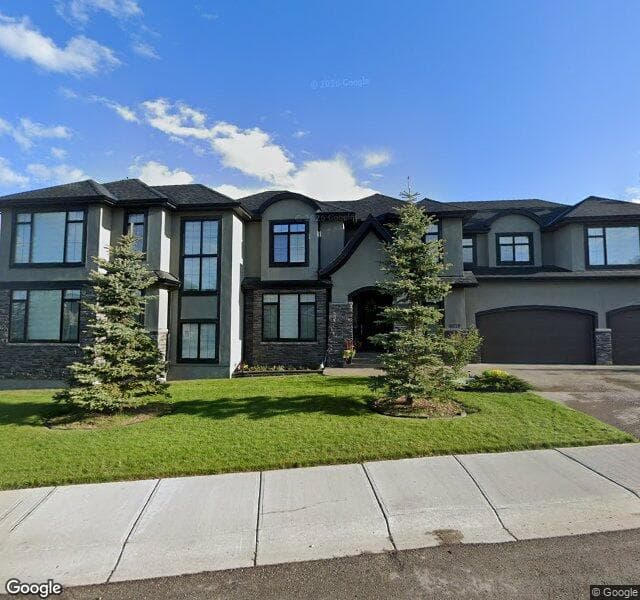 Street view of 8070 Spring Willow Drive SW, Calgary