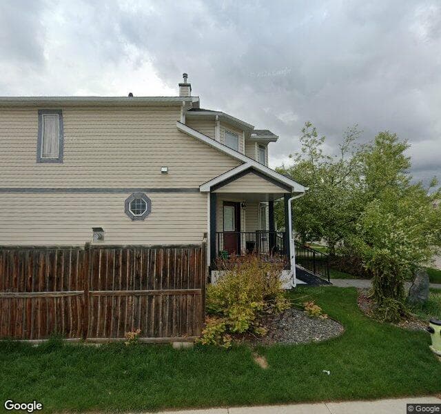 Street view of 203 Bridlewood Avenue SW, Calgary