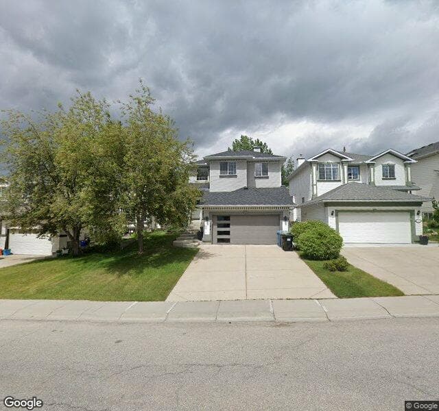 Street view of 136 Rocky Ridge Drive NW, Calgary