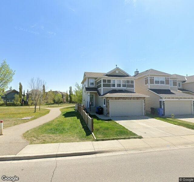 Street view of 18 Cougar Plateau Way SW, Calgary