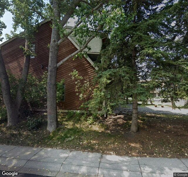 Street view of 171 Woodvale Bay SW, Calgary