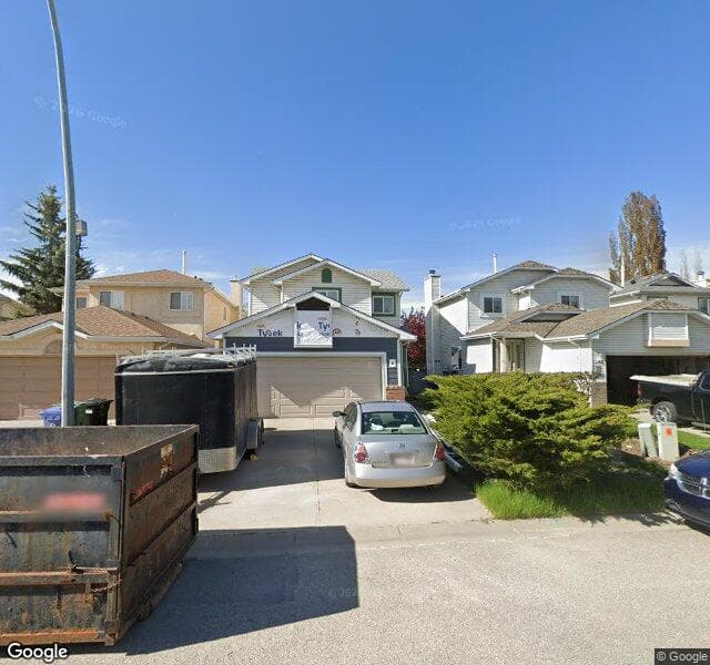 Street view of 76 Riverwood Close SE, Calgary
