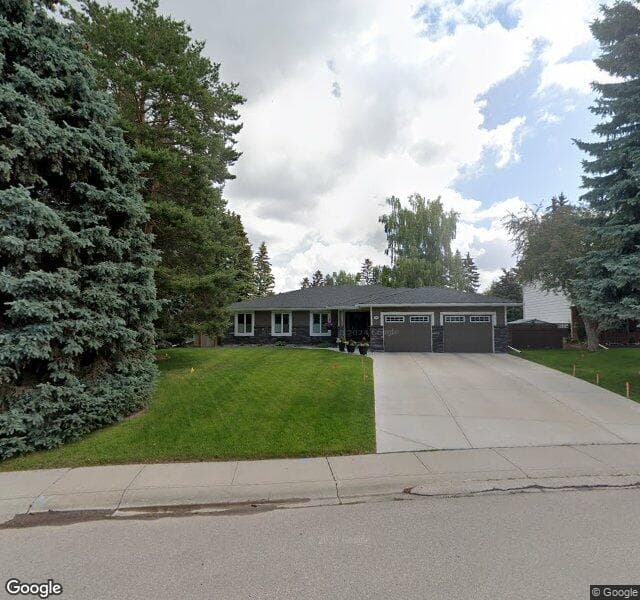 Street view of 504 Wilderness Drive SE, Calgary