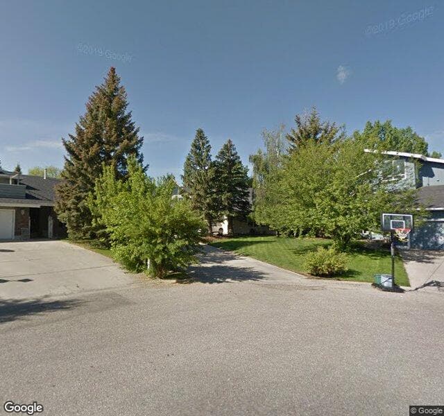 Street view of 332 Pump Hill Gardens SW, Calgary