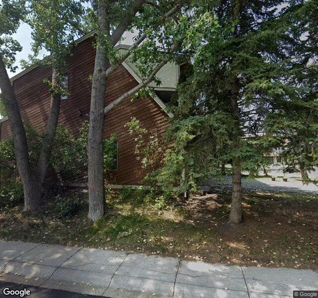 Street view of 175 Woodvale Bay SW, Calgary