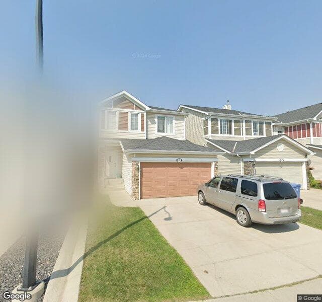 Street view of 151 Cougar Plateau Way SW, Calgary